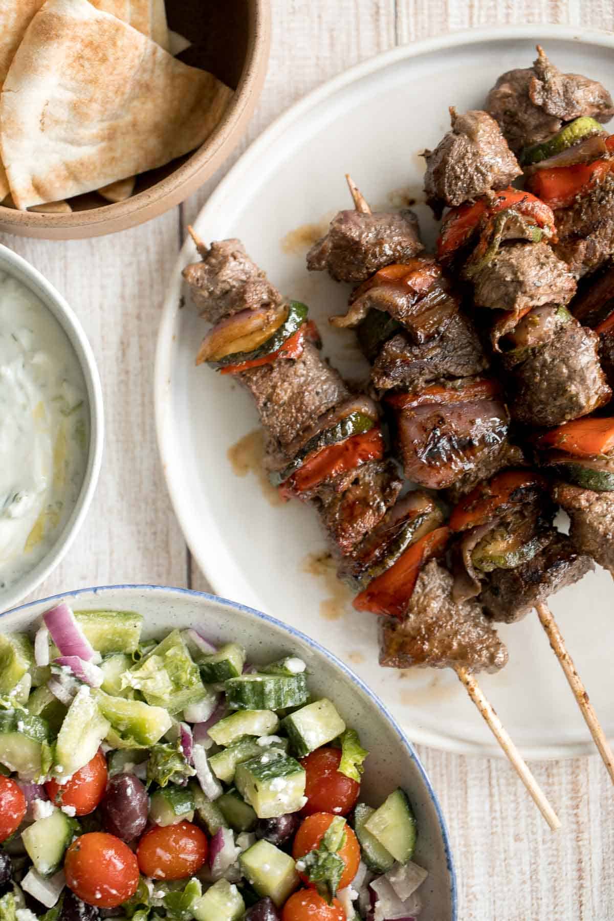 Easy Greek Souvlaki Beef Shish Kebabs are delicious and flavorful, made with a simple marinade and fresh vegetables. Cook on the grill or oven. | aheadofthyme.com