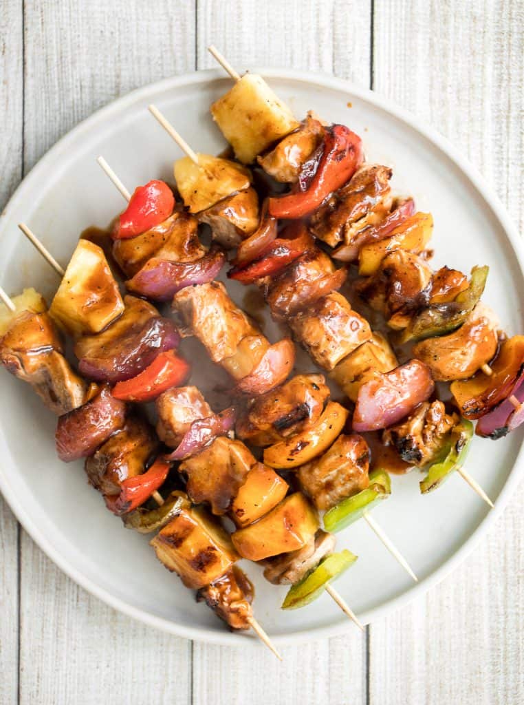 Juicy and tender teriyaki chicken skewers with pineapple, bell peppers and red onions are sticky, sweet, savoury, and tangy. So flavourful and delicious. | aheadofthyme.com