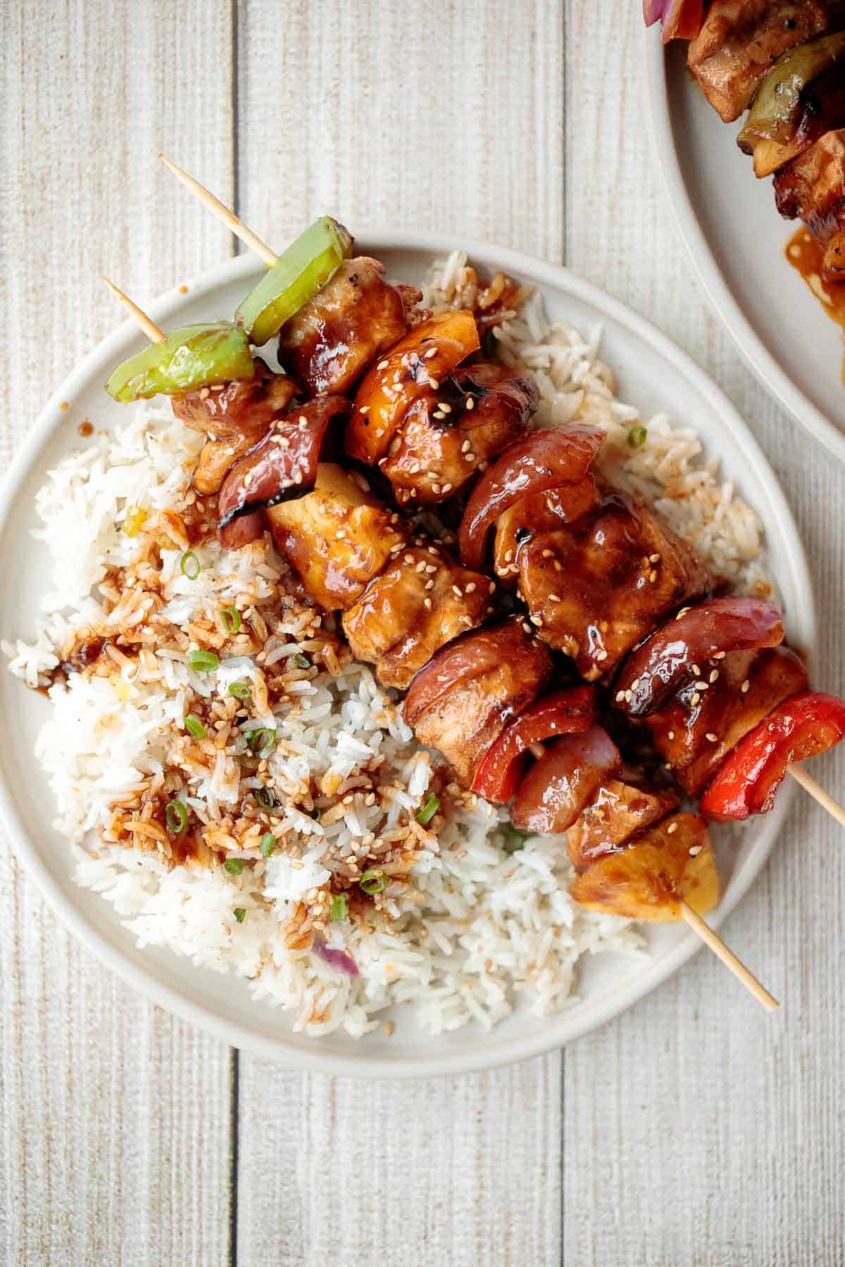 Juicy and tender Teriyaki Chicken Skewers with pineapple, bell peppers and red onions are sticky, sweet, savoury, and tangy. So flavourful and delicious. | aheadofthyme.com