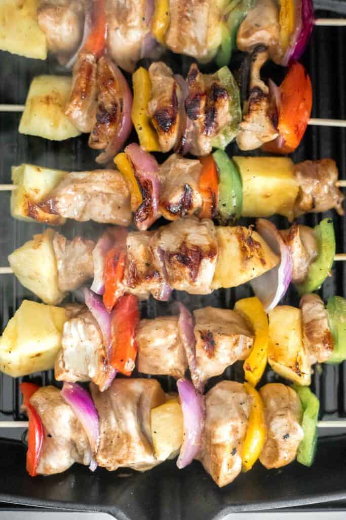 Juicy and tender Teriyaki Chicken Skewers with pineapple, bell peppers and red onions are sticky, sweet, savoury, and tangy. So flavourful and delicious. | aheadofthyme.com