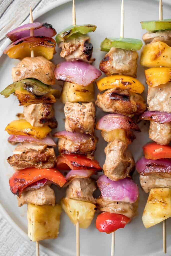 Juicy and tender Teriyaki Chicken Skewers with pineapple, bell peppers and red onions are sticky, sweet, savoury, and tangy. So flavourful and delicious. | aheadofthyme.com