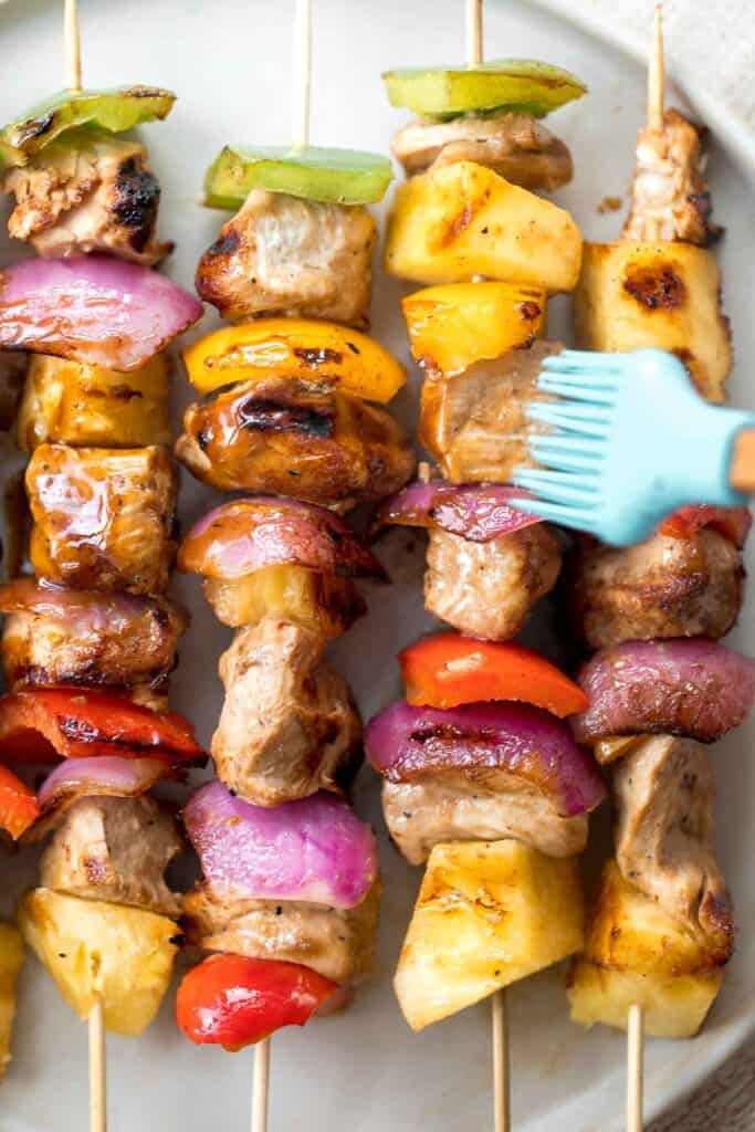 Juicy and tender Teriyaki Chicken Skewers with pineapple, bell peppers and red onions are sticky, sweet, savoury, and tangy. So flavourful and delicious. | aheadofthyme.com