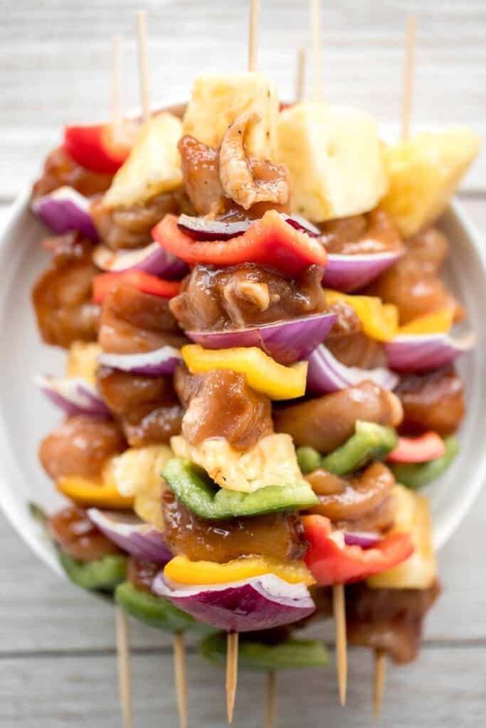 Juicy and tender Teriyaki Chicken Skewers with pineapple, bell peppers and red onions are sticky, sweet, savoury, and tangy. So flavourful and delicious. | aheadofthyme.com