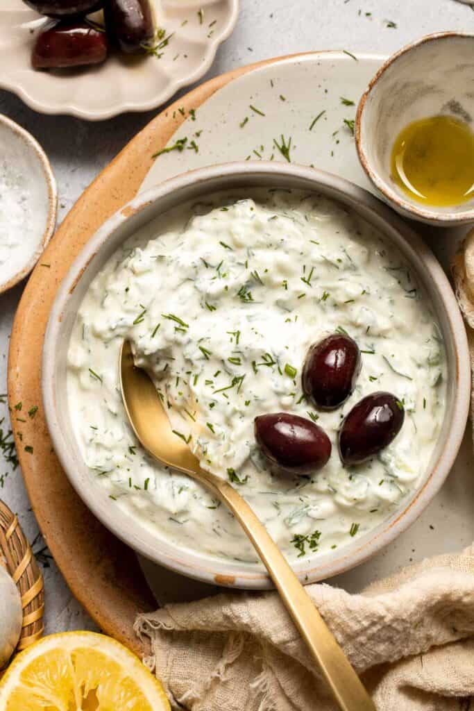 Easy Tzatziki Sauce is a cool, creamy Greek dip made with thick Greek yogurt, crisp cucumber, zesty lemon juice, and fresh dill. Quick and easy too! | aheadofthyme.com