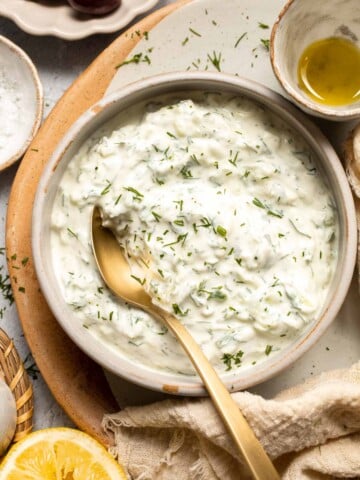 Easy Tzatziki Sauce is a cool, creamy Greek dip made with thick Greek yogurt, crisp cucumber, zesty lemon juice, and fresh dill. Quick and easy too! | aheadofthyme.com