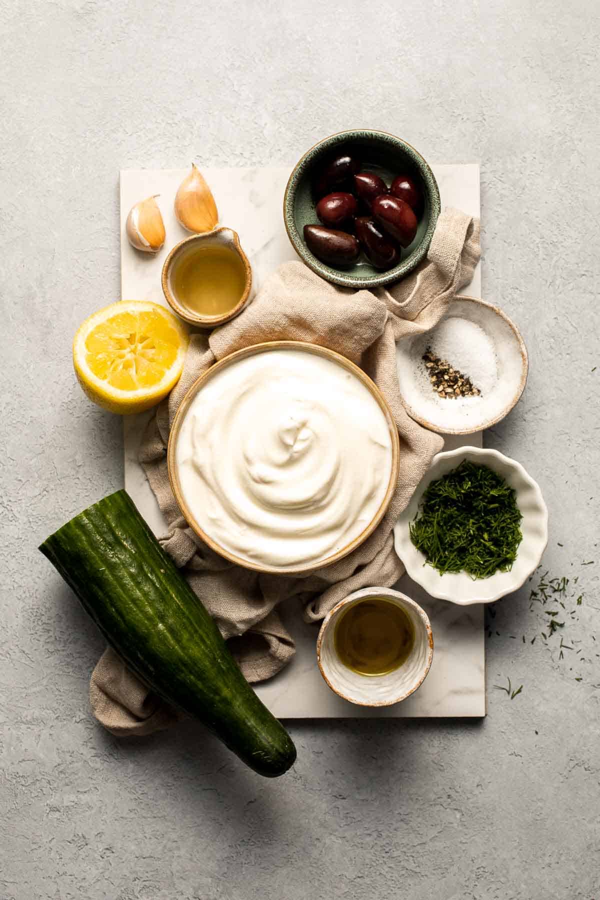 Easy Tzatziki Sauce is a cool, creamy Greek dip made with thick Greek yogurt, crisp cucumber, zesty lemon juice, and fresh dill. Quick and easy too! | aheadofthyme.com