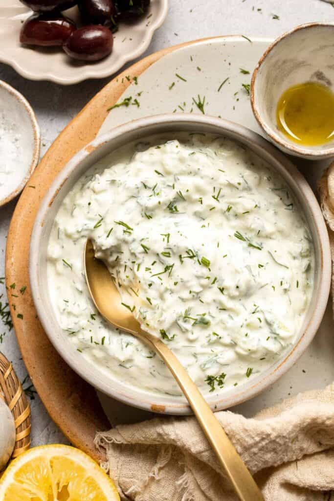Easy Tzatziki Sauce is a cool, creamy Greek dip made with thick Greek yogurt, crisp cucumber, zesty lemon juice, and fresh dill. Quick and easy too! | aheadofthyme.com