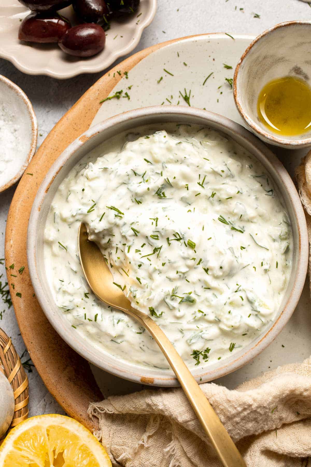 Easy Tzatziki Sauce is a cool, creamy Greek dip made with thick Greek yogurt, crisp cucumber, zesty lemon juice, and fresh dill. Quick and easy too! | aheadofthyme.com
