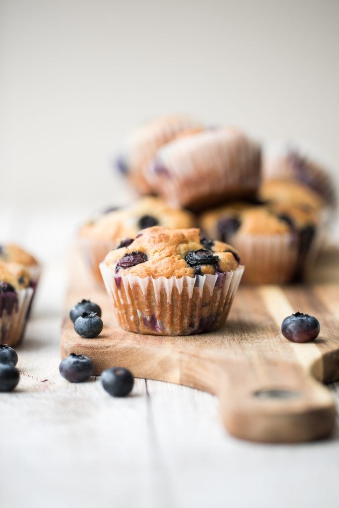 Blueberry yogurt muffins are buttery, moist, soft, and cakey and bursting with blueberries in every single bite. They are super quick and easy to make. | aheadofthyme.com