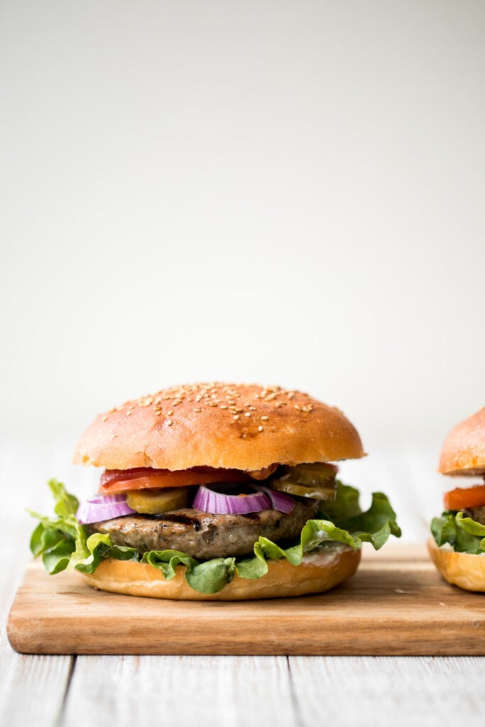 Better than the steakhouse, these classic juicy hamburgers are perfectly seasoned, so flavourful and delicious. Make them on the grill or on the stove. | aheadofthyme.com