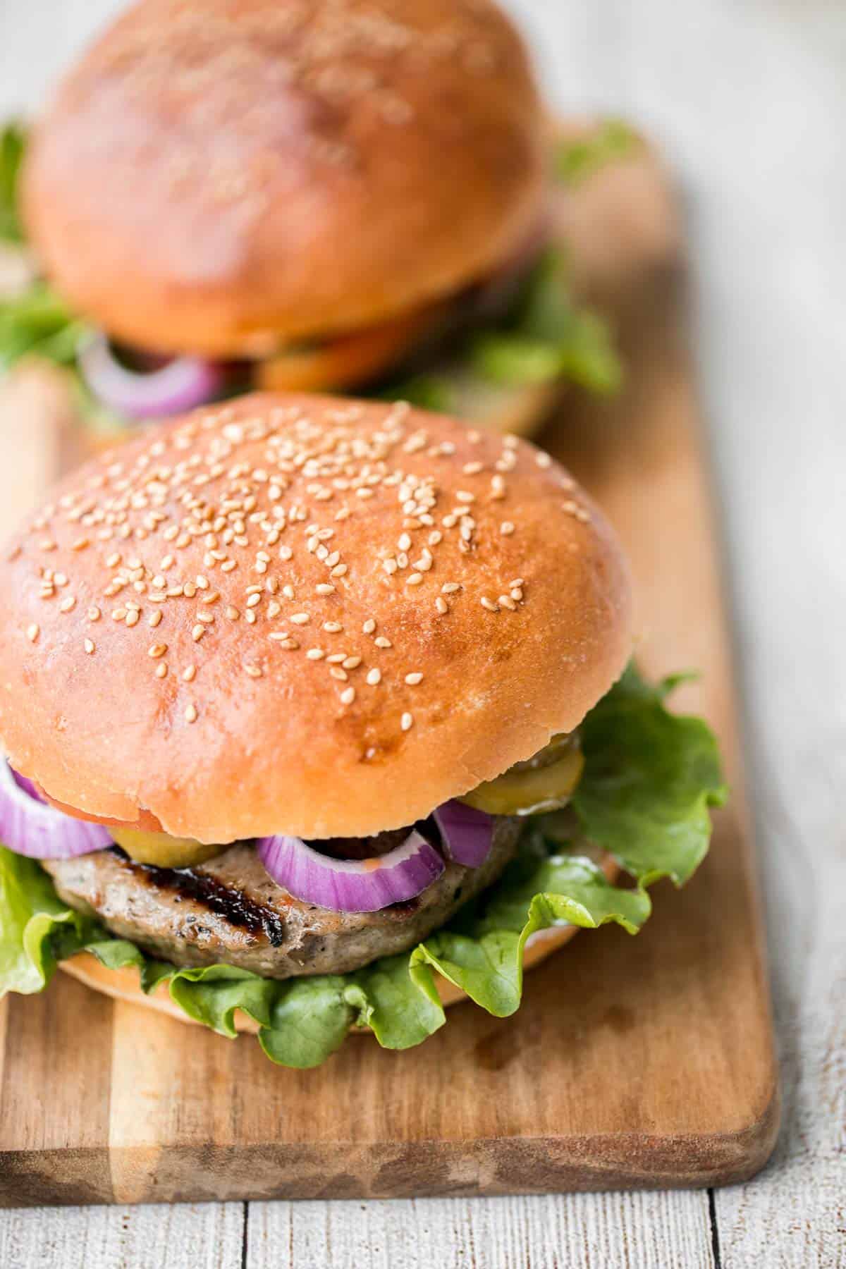 Better than the steakhouse, these classic juicy hamburgers are perfectly seasoned, so flavourful and delicious. Make them on the grill or on the stove. | aheadofthyme.com