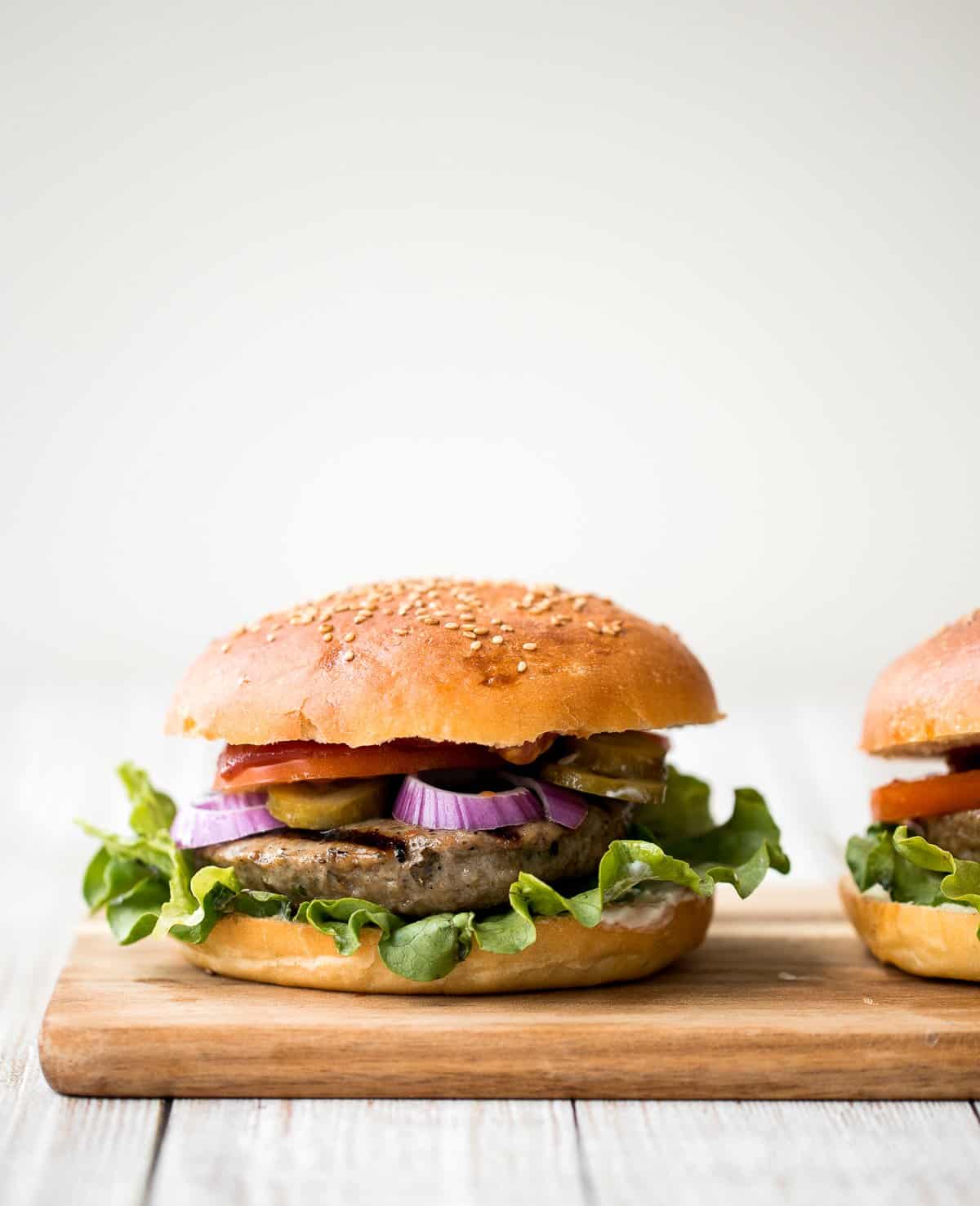 Better than the steakhouse, these classic juicy hamburgers are perfectly seasoned, so flavourful and delicious. Make them on the grill or on the stove. | aheadofthyme.com