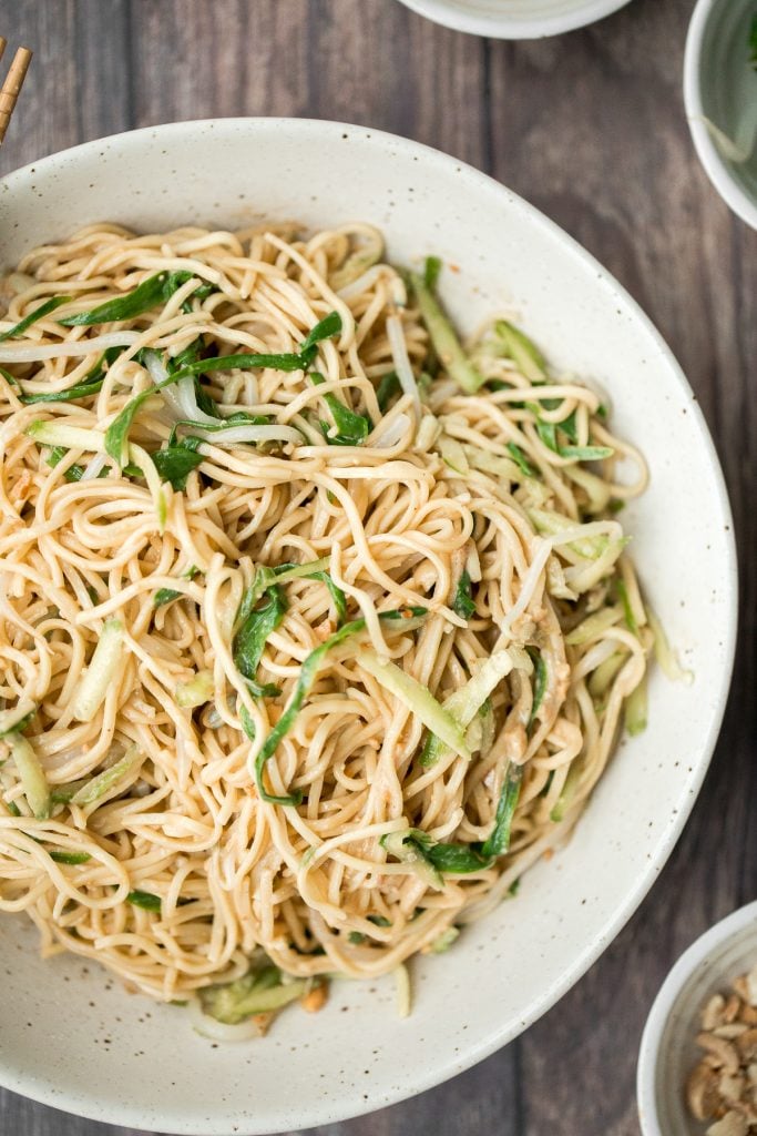 Easy vegan Shanghai style cold noodles tossed in peanut butter sauce with fresh vegetables and Asian seasonings, are flavourful and ready in 10 minutes. | aheadofthyme.com