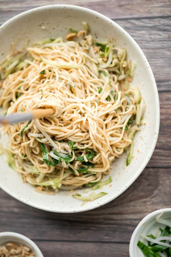 Easy vegan Shanghai style cold noodles tossed in peanut butter sauce with fresh vegetables and Asian seasonings, are flavourful and ready in 10 minutes. | aheadofthyme.com