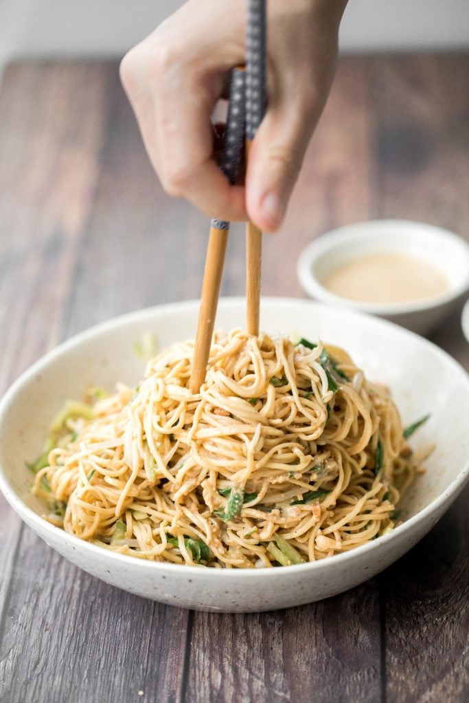 Easy vegan Shanghai style cold noodles tossed in peanut butter sauce with fresh vegetables and Asian seasonings, are flavourful and ready in 10 minutes. | aheadofthyme.com