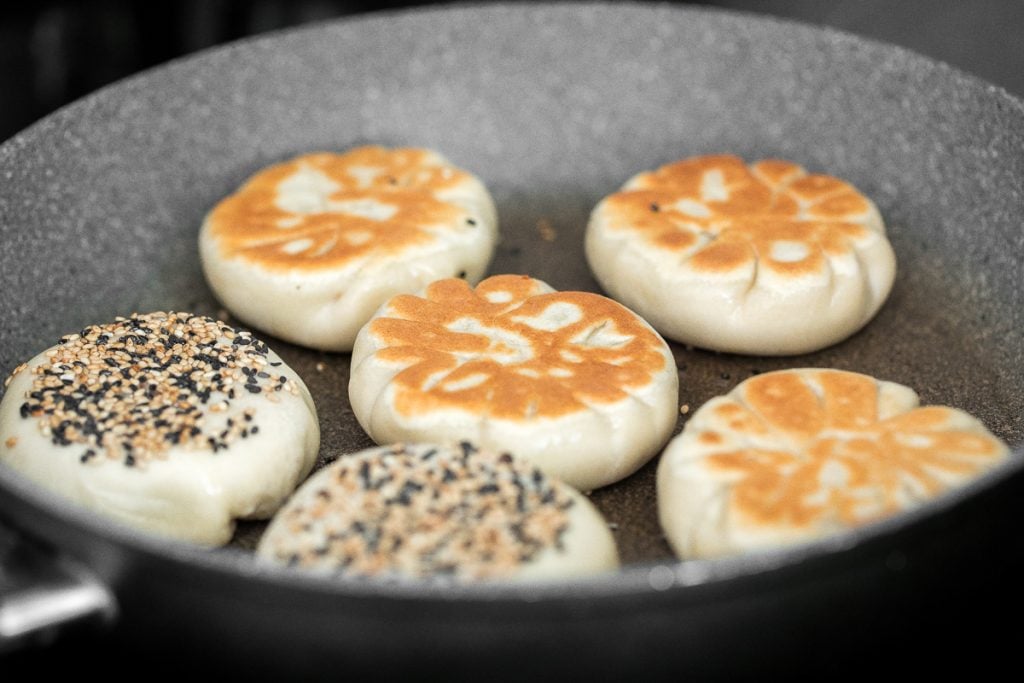 Crispy bottom pan-fried fried vegetable buns (no yeast) are crunchy outside yet tender inside with a mushroom, carrot and vermicelli vegetarian filling. | aheadofthyme.com