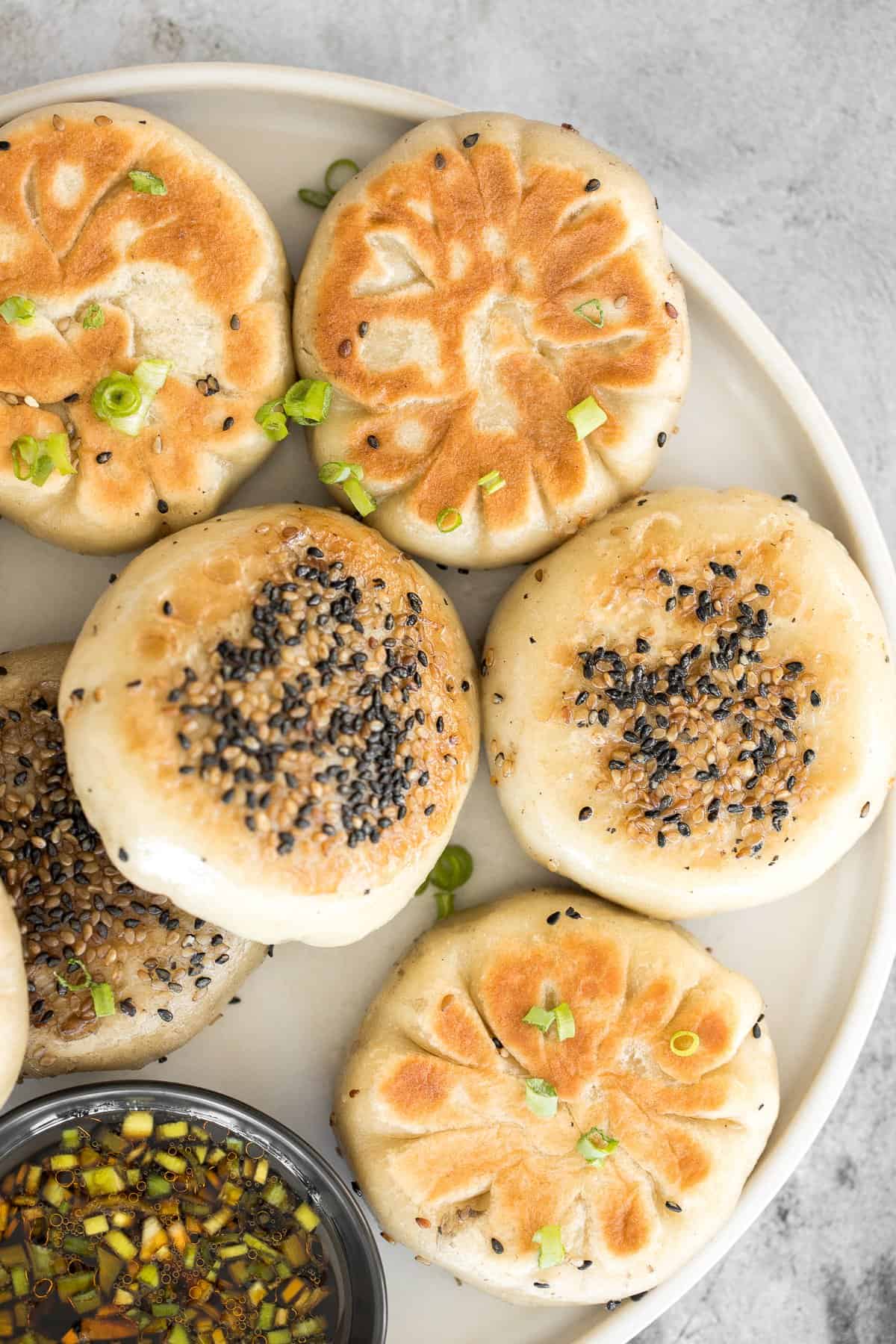 Crispy bottom pan-fried fried vegetable buns (no yeast) are crunchy outside yet tender inside with a mushroom, carrot and vermicelli vegetarian filling. | aheadofthyme.com