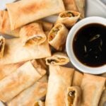 Better than takeout, light and crispy fried vegetarian spring rolls are packed with a tender mushroom and cabbage vegetarian filling in a crunchy skin. | aheadofthyme.com
