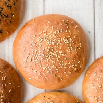 Soft and fluffy, artisan, easy homemade hamburger buns topped with sesame seeds are light, airy, so flavourful and take just 15 minutes of actual prep work. | aheadofthyme.com