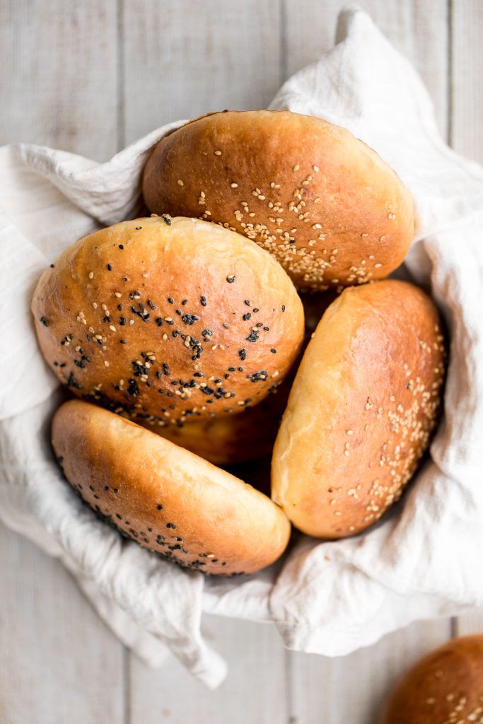 Soft and fluffy, artisan, easy homemade hamburger buns topped with sesame seeds are light, airy, so flavourful and take just 15 minutes of actual prep work. | aheadofthyme.com