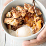 Easy peach cobbler is packed with sweet and juicy fresh peaches and topped with a buttery, golden topping. Make it with just 15-minutes of actual prep work. | aheadofthyme.com