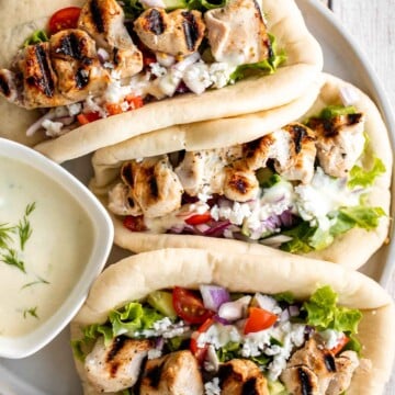 These Greek Chicken Gyros (with Homemade Tzatziki) are fresh, flavorful, and easy to make — perfect for a quick Mediterranean-inspired dinner or lunch. | aheadofthyme.com