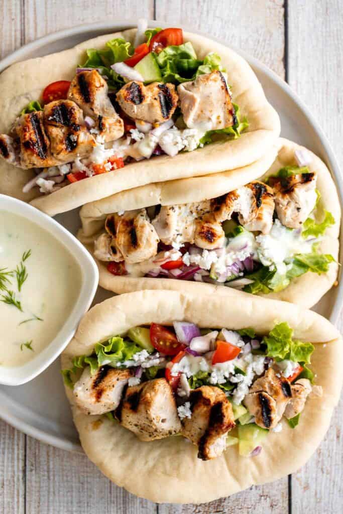 These Greek Chicken Gyros (with Homemade Tzatziki) are fresh, flavorful, and easy to make — perfect for a quick Mediterranean-inspired dinner or lunch. | aheadofthyme.com