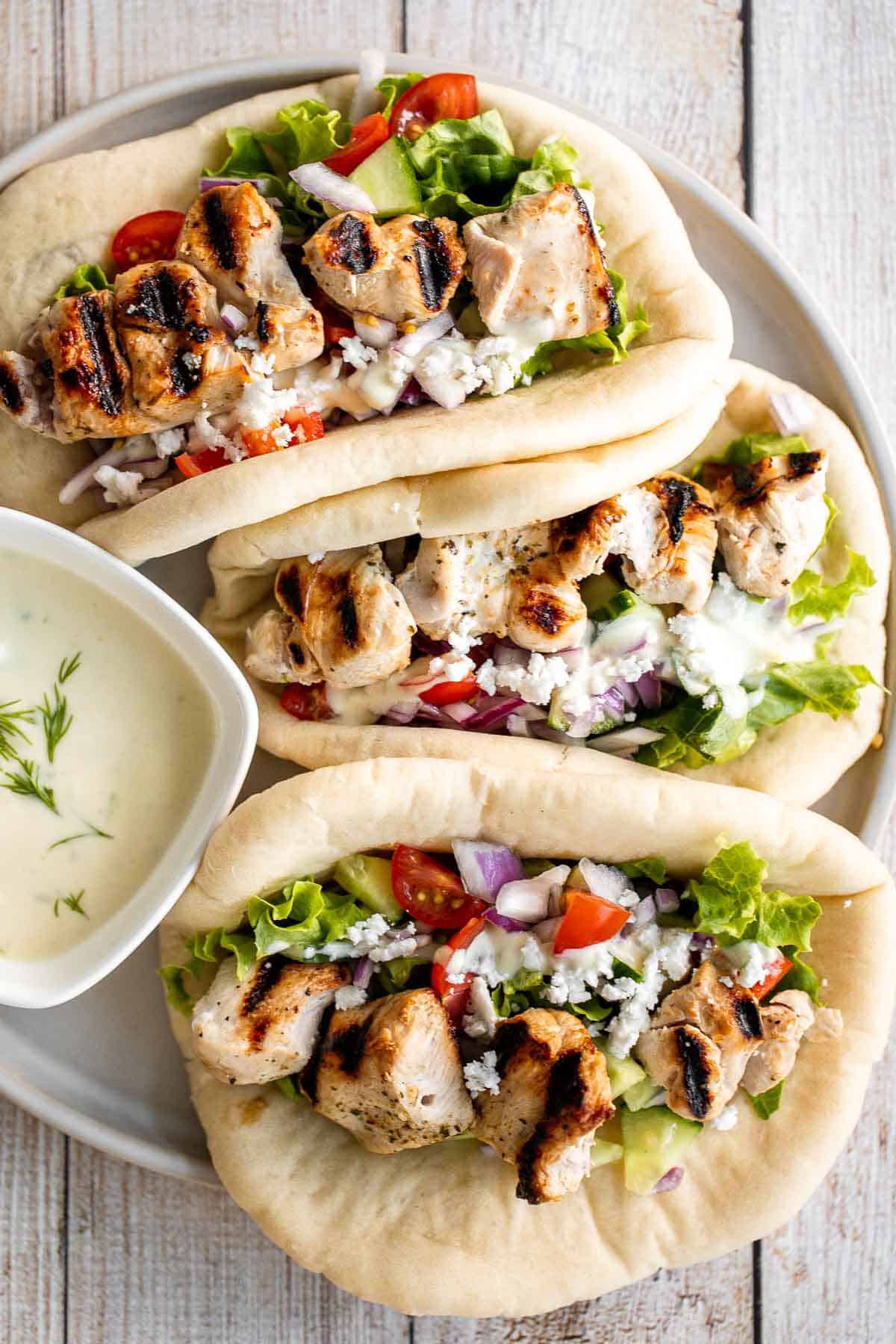 These Greek Chicken Gyros (with Homemade Tzatziki) are fresh, flavorful, and easy to make — perfect for a quick Mediterranean-inspired dinner or lunch. | aheadofthyme.com