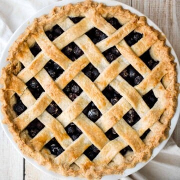 This Homemade Blueberry Pie with Lattice Top features a perfect flaky crust and jammy filling. It's a classic summer dessert made from scratch. | aheadofthyme.com