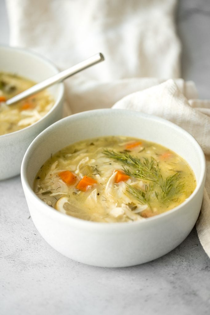 Smooth, hearty and light, one pot lemon chicken orzo soup is pure comfort in a bowl. This family favourite is like chicken noodle soup with a major upgrade. | aheadofthyme.com