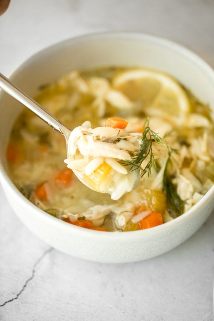 Smooth, hearty and light, one pot lemon chicken orzo soup is pure comfort in a bowl. This family favourite is like chicken noodle soup with a major upgrade. | aheadofthyme.com