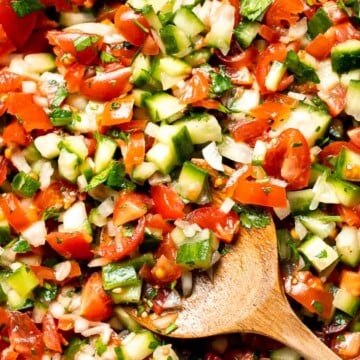 Persian Shirazi Salad with cucumber and tomato is a healthy, light, and simple salad packed with herbs and tossed in an olive oil lime dressing. | aheadofthyme.com