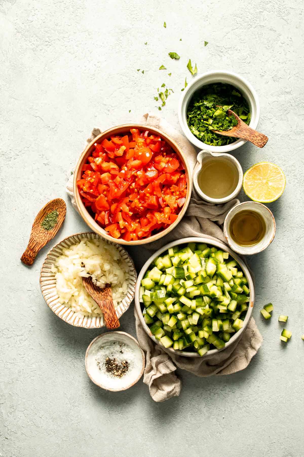 Persian Shirazi Salad with cucumber and tomato is a healthy, light, and simple salad packed with herbs and tossed in an olive oil lime dressing. | aheadofthyme.com
