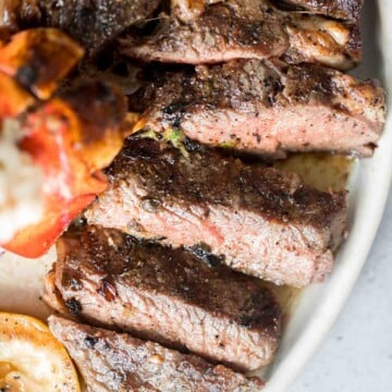 Better than the steakhouse, the best tender and juicy Ribeye Steak with a perfect seared crust is garlicky, buttery and packed with so much flavour. | aheadofthyme.com
