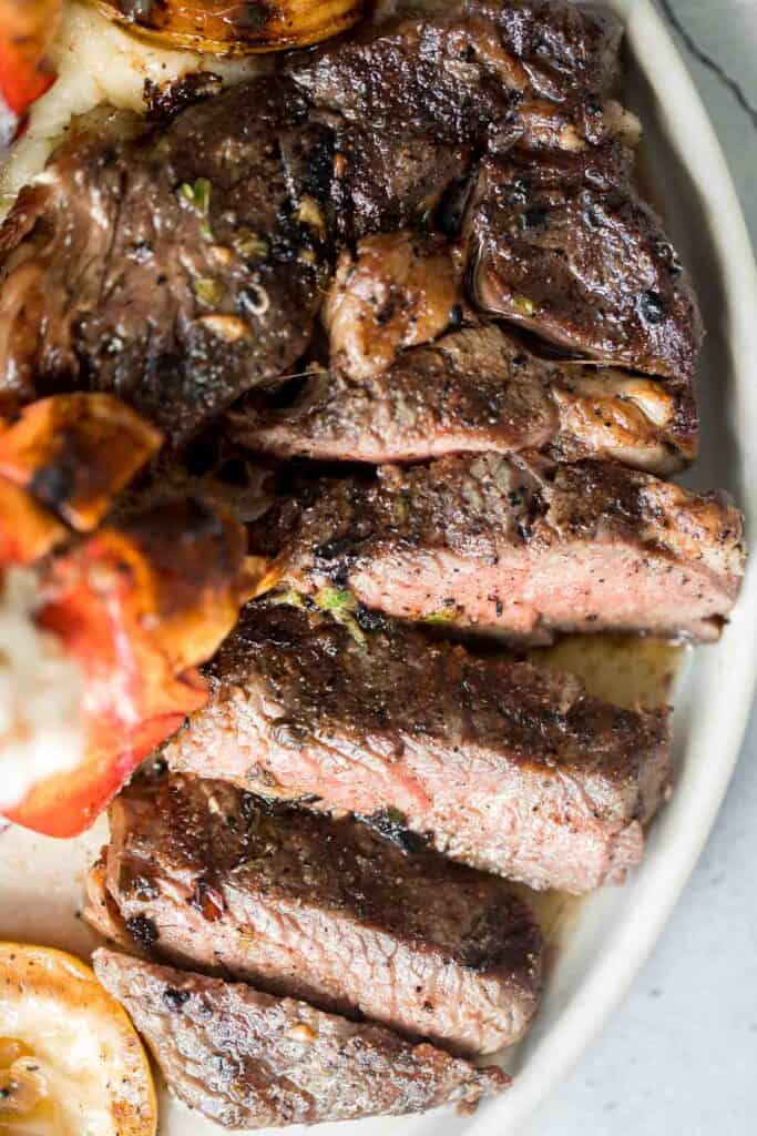 Better than the steakhouse, the best tender and juicy Ribeye Steak with a perfect seared crust is garlicky, buttery and packed with so much flavour. | aheadofthyme.com