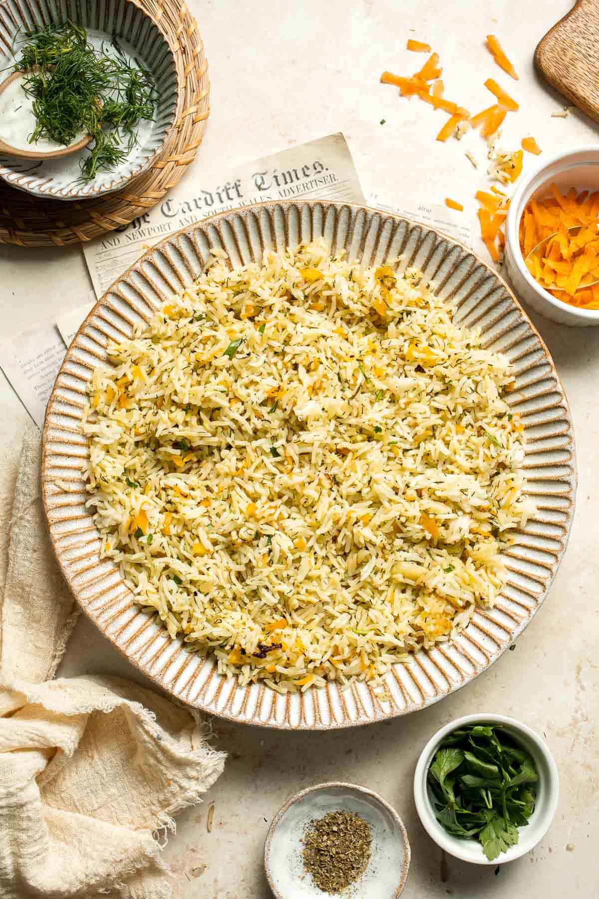 One pot Rice Pilaf with Carrots is quick, easy, and loaded with flavor. Cook this vegetable rice on the stove, rice cooker, or instant pot. | aheadofthyme.com