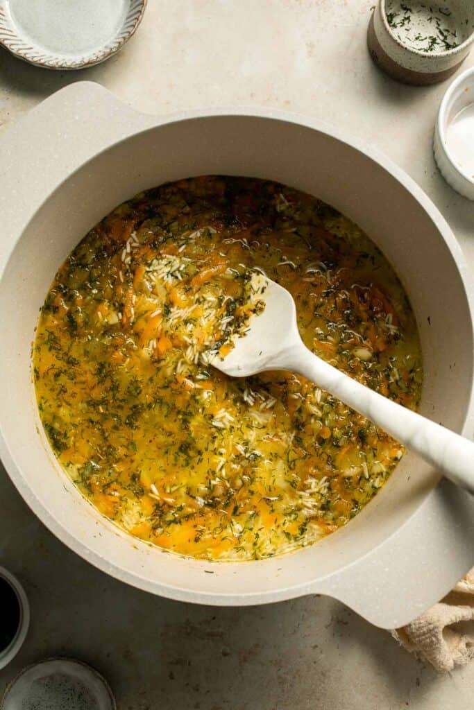 One pot Rice Pilaf with Carrots is quick, easy, and loaded with flavor. Cook this vegetable rice on the stove, rice cooker, or instant pot. | aheadofthyme.com