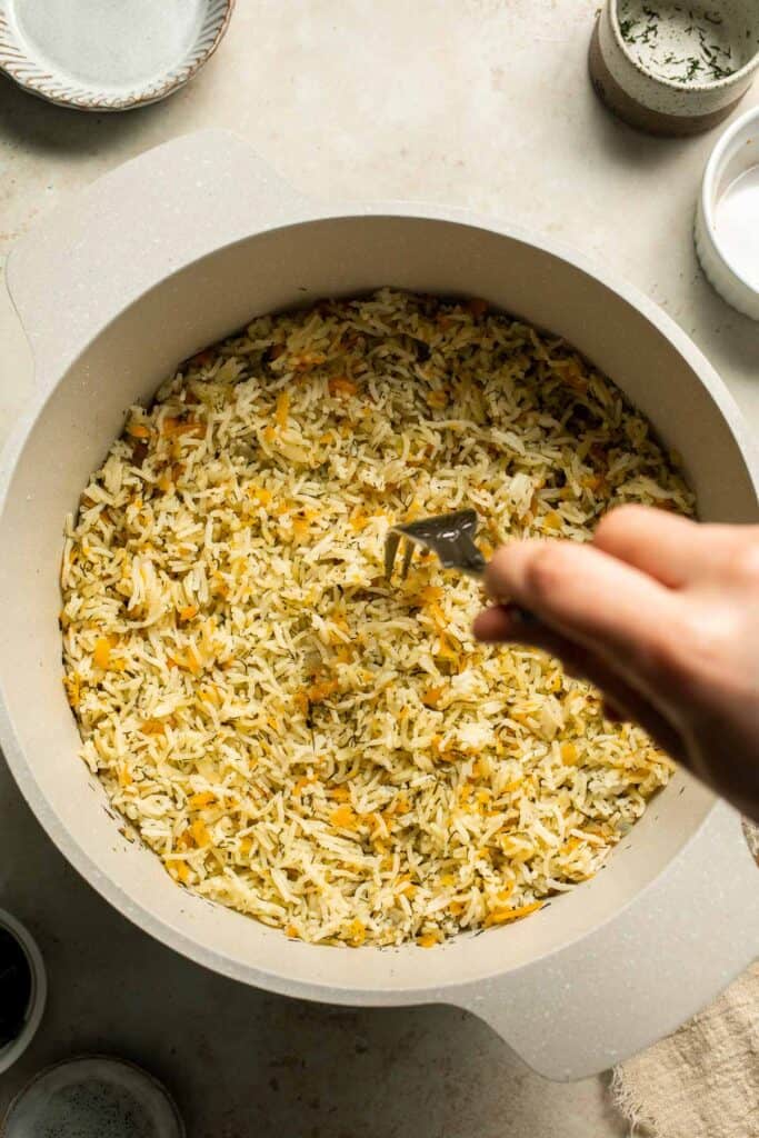 One pot Rice Pilaf with Carrots is quick, easy, and loaded with flavor. Cook this vegetable rice on the stove, rice cooker, or instant pot. | aheadofthyme.com