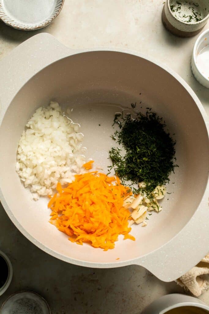 One pot Rice Pilaf with Carrots is quick, easy, and loaded with flavor. Cook this vegetable rice on the stove, rice cooker, or instant pot. | aheadofthyme.com