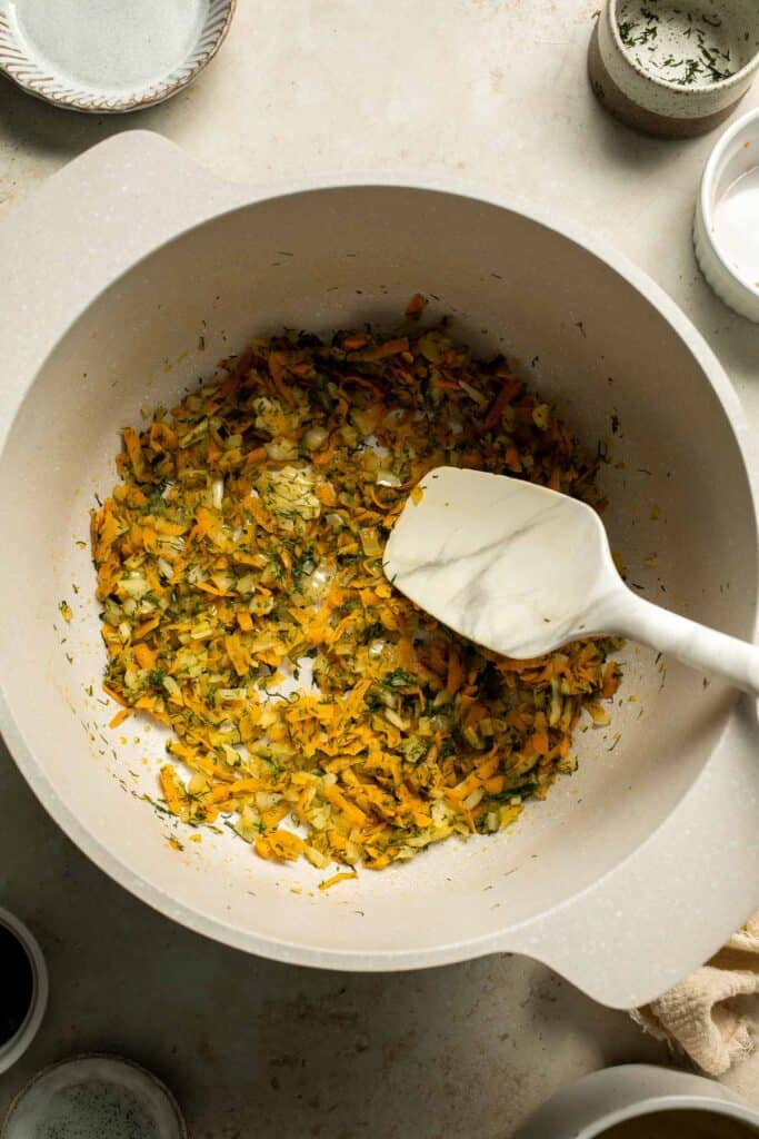 One pot Rice Pilaf with Carrots is quick, easy, and loaded with flavor. Cook this vegetable rice on the stove, rice cooker, or instant pot. | aheadofthyme.com