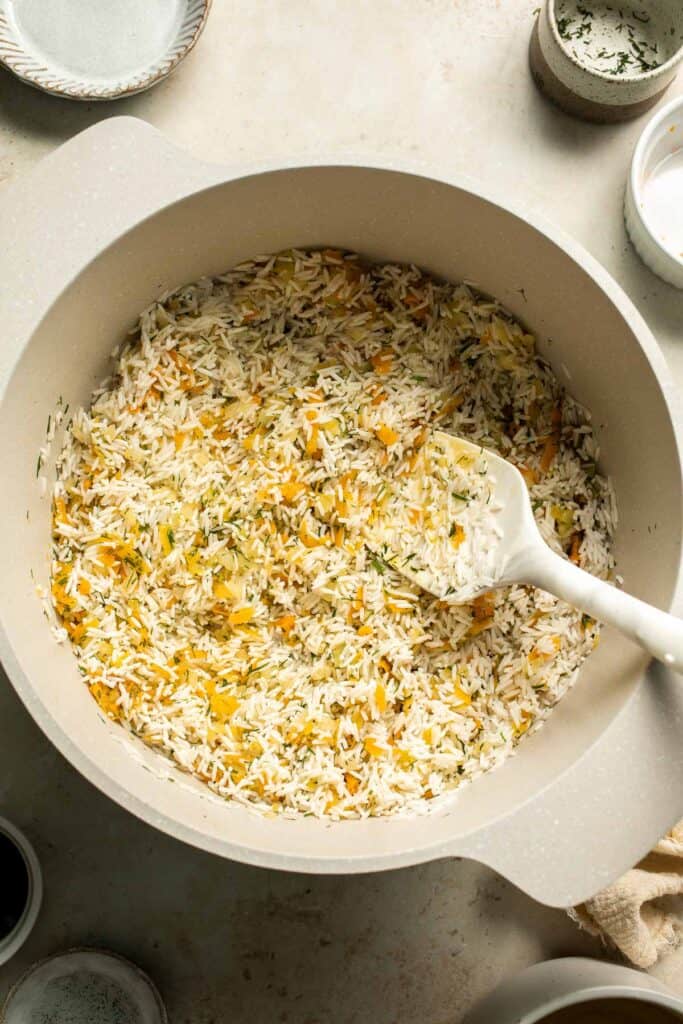 One pot Rice Pilaf with Carrots is quick, easy, and loaded with flavor. Cook this vegetable rice on the stove, rice cooker, or instant pot. | aheadofthyme.com
