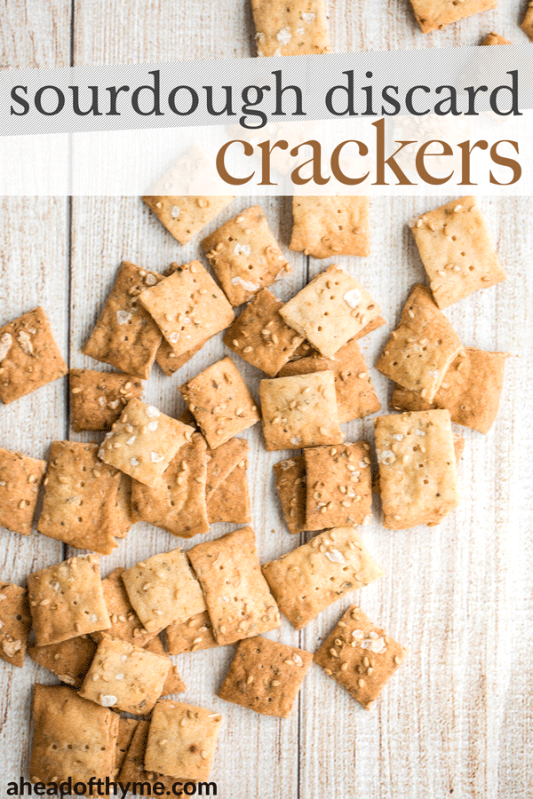 Quick and easy sourdough discard crackers are thin, crispy, crunchy and flavoured with sesame seeds, dried herbs and flaked salt. They are so addictive. | aheadofthyme.com