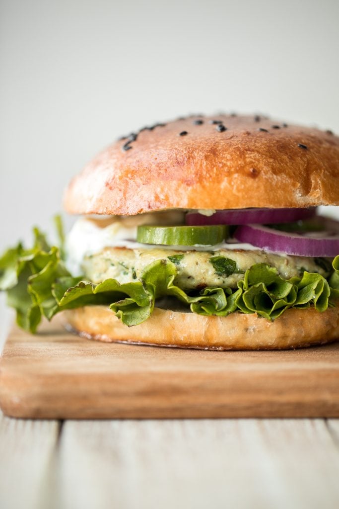 Greek-style spinach and feta turkey burgers are tender, juicy, and flavourful, loaded with spinach, feta and fresh Mediterranean herbs + so easy to prep. | aheadofthyme.com