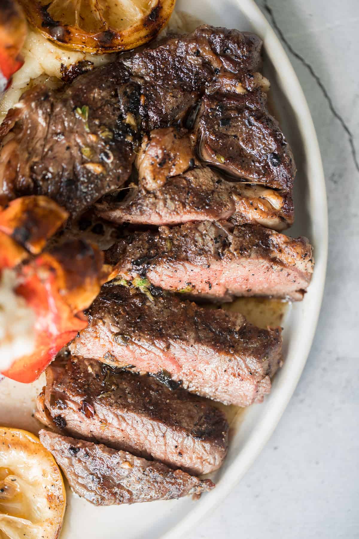 Better than the steakhouse, the best tender and juicy ribeye steak with a perfect seared crust is garlicky, buttery and packed with so much flavour. | aheadofthyme.com