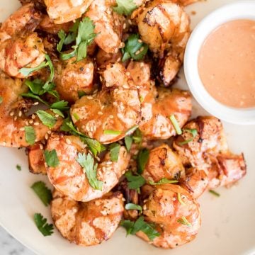 10-minute air fryer jumbo shrimp is juicy and tender on the inside, and crispy on the outside. It's so flavourful and garlicky with Asian seasonings. | aheadofthyme.com