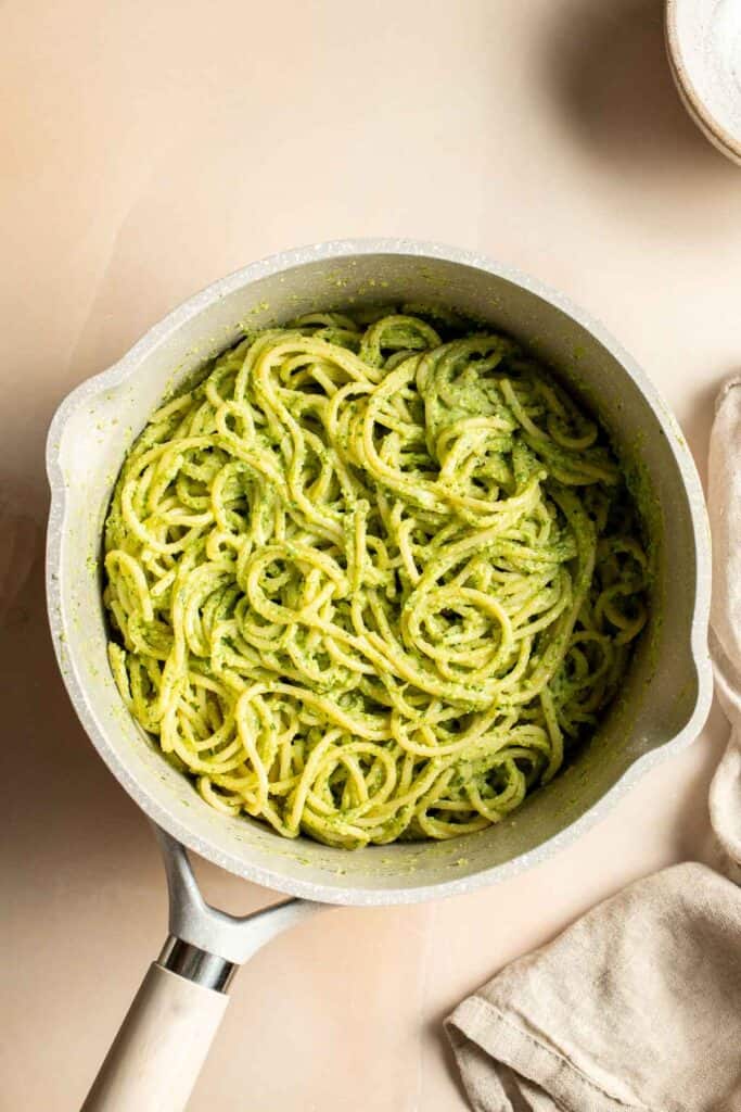 This creamy Avocado Pesto Pasta is healthy, light, and delicious. This quick and easy vegan pasta comes together in just 15 minutes (including prep!). | aheadofthyme.com