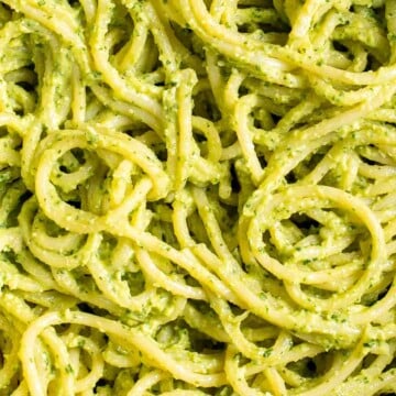 This creamy Avocado Pesto Pasta is healthy, light, and delicious. This quick and easy vegan pasta comes together in just 15 minutes (including prep!). | aheadofthyme.com