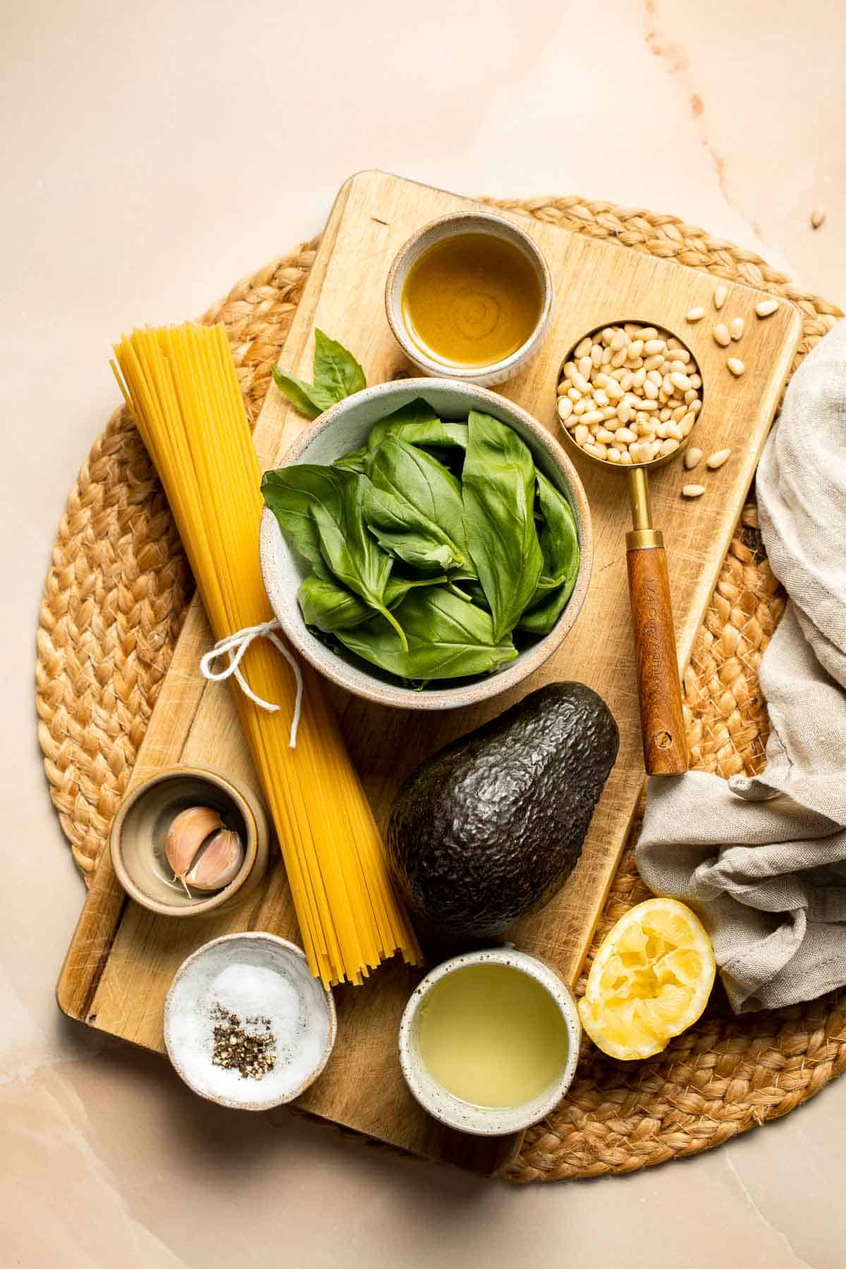 This creamy Avocado Pesto Pasta is healthy, light, and delicious. This quick and easy vegan pasta comes together in just 15 minutes (including prep!). | aheadofthyme.com