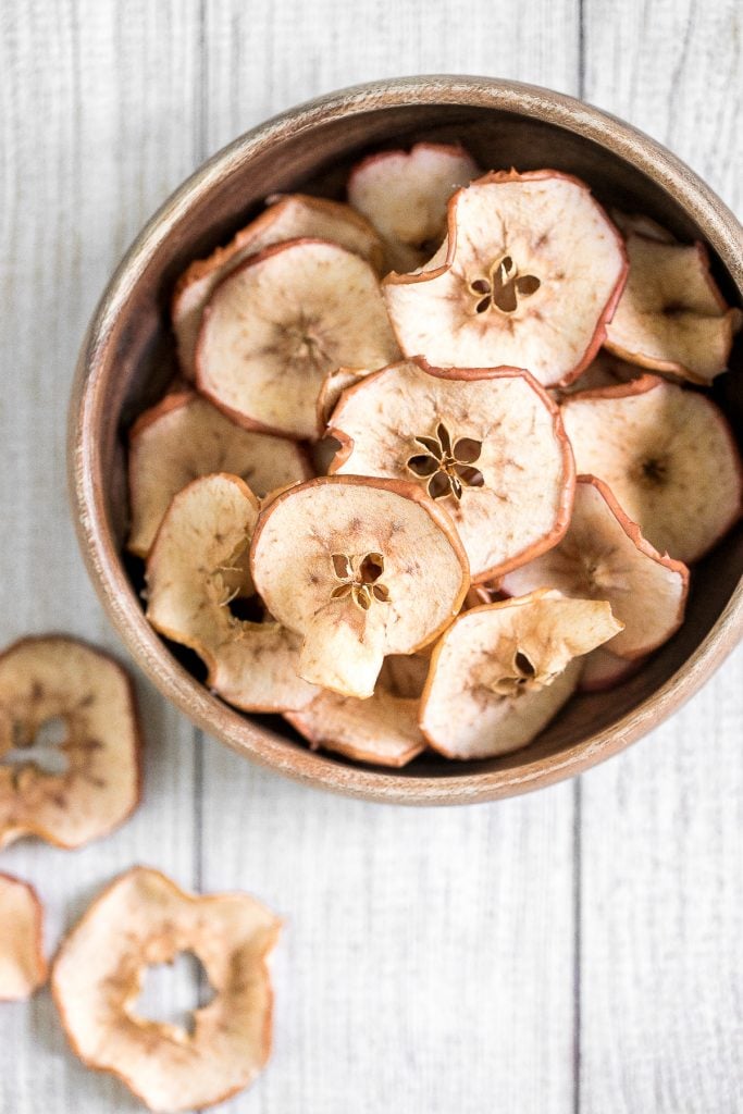 One-ingredient homemade baked apple chips are healthy, light, crispy and so addictive. They contain no added sugar and are so easy to make at home. | aheadofthyme.com