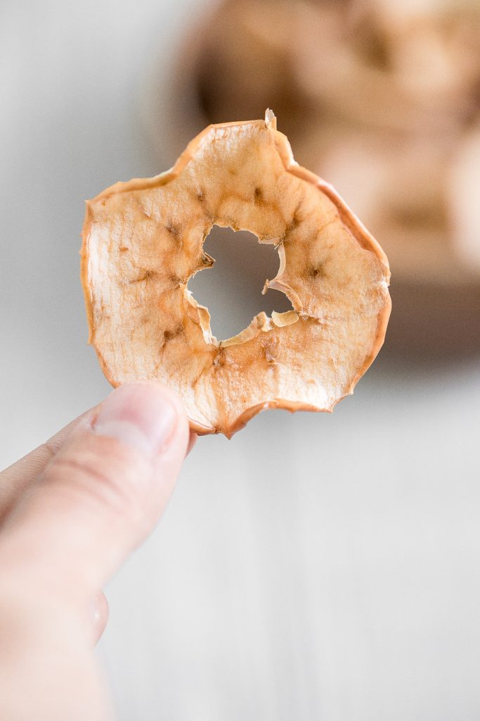 One-ingredient homemade baked apple chips are healthy, light, crispy and so addictive. They contain no added sugar and are so easy to make at home. | aheadofthyme.com